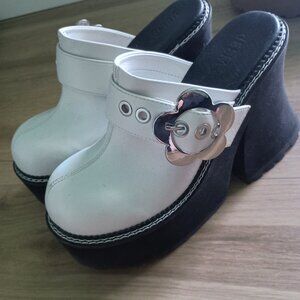Delia's 70's inspired platform clogs